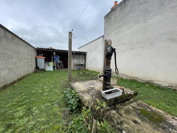Maison de bourg bien située, avec jardin et potentiel d'aménagement