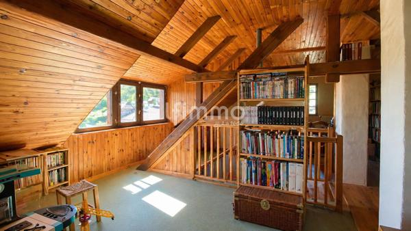 Maison sur terrain de 27 ares avec source