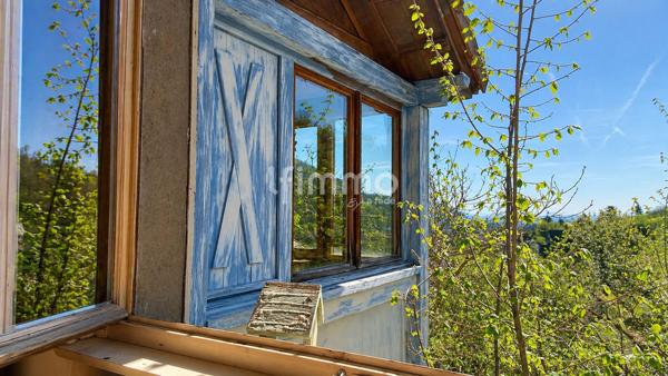 Maison sur terrain de 27 ares avec source