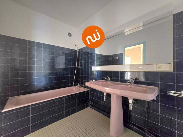 Appartement T4 91m² à Tassin le Bourg - Parking privé