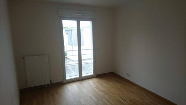 Appartement 2 pièces 43m2 avec balcon et parking - Secteur Saint Michel