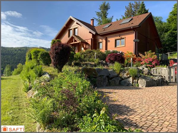 Chalet d'exception avec grand terrain paysagé de 2000 M2 ,  proximité des pistes et de la nature, emplacement rare.