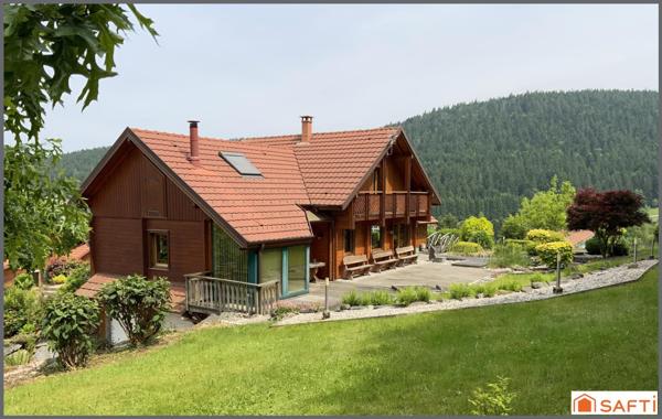 Chalet d'exception avec grand terrain paysagé de 2000 M2 ,  proximité des pistes et de la nature, emplacement rare.