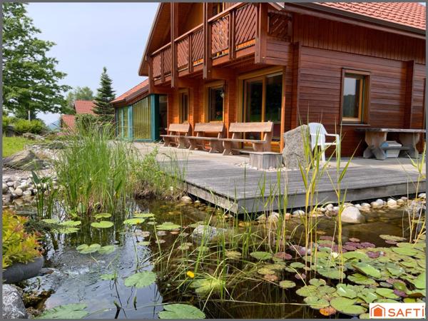 Chalet d'exception avec grand terrain paysagé de 2000 M2 ,  proximité des pistes et de la nature, emplacement rare.