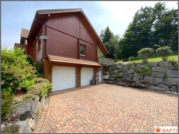 Chalet d'exception avec grand terrain paysagé de 2000 M2 ,  proximité des pistes et de la nature, emplacement rare.