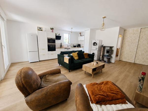 Appartement trois pièces avec son jardin et sa place privative