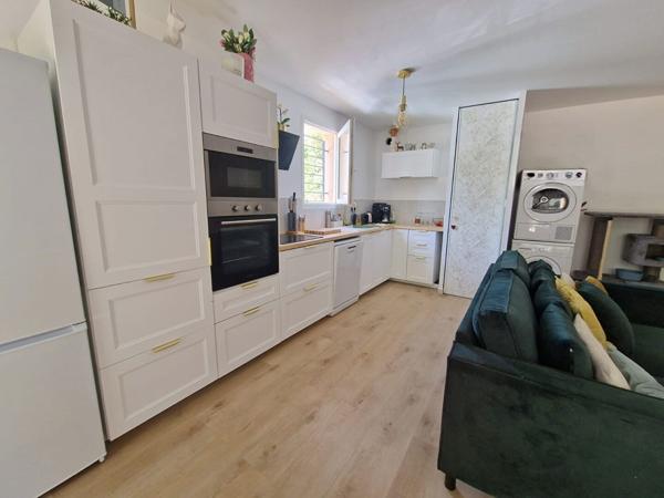 Appartement trois pièces avec son jardin et sa place privative