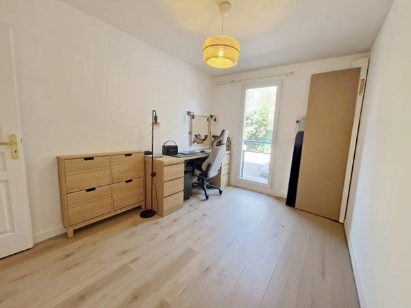 Appartement trois pièces avec son jardin et sa place privative