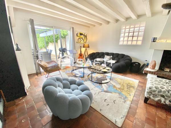 Maison familiale avec local commercial et appartement