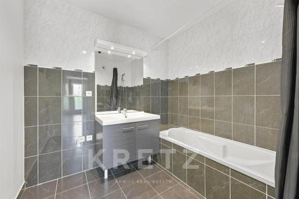 T5 en attique avec 45 m² de terrasses – Résidence de standing – Garage.