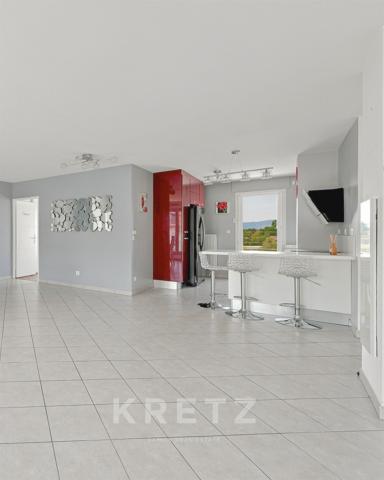 T5 en attique avec 45 m² de terrasses – Résidence de standing – Garage.