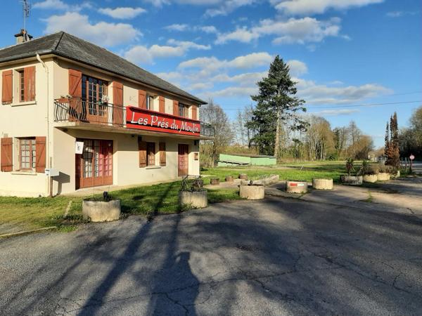 RARE OPPORTUNITÉ . GRAND BATIMENT AVEC LOGEMENT,  HANGAR ET PARKING SUR 6032 M²