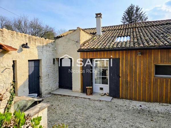 Charmante maison en pierre dans un bel environnement, clos, quatre chambres, trois salles d'eau, jardin et petites dépendances !!!