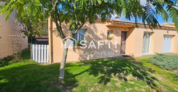 Maison de plain pied proche clinique avec 3 chambres, garage et abri-terrasse.