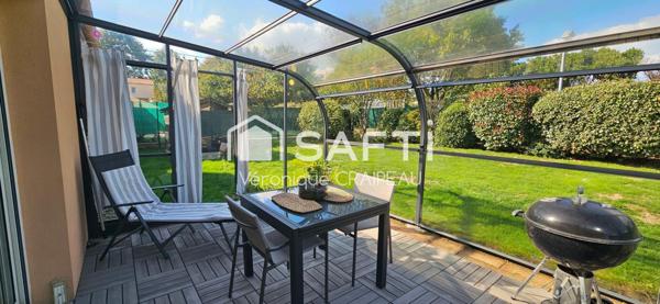 Maison de plain pied proche clinique avec 3 chambres, garage et abri-terrasse.