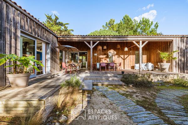 Maison à ossature bois, douceur de vivre les pieds dans le sable