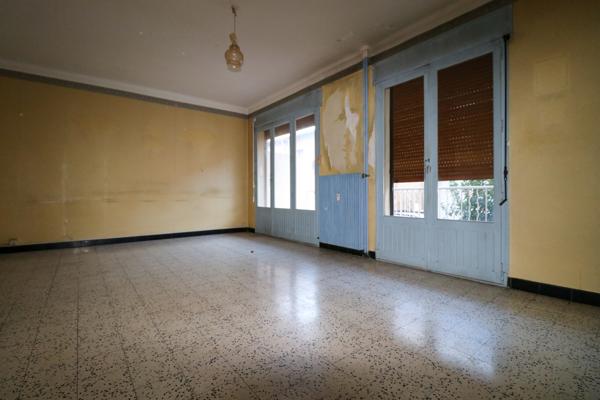 Appartement de 57 m² avec balcon, proche du centre-ville de Nîmes