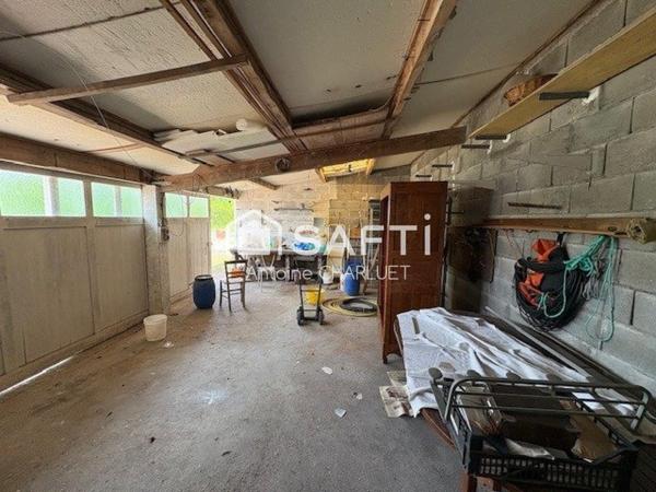 Maison de bourg 95m² - 3 chambres - dépendances - terrain 1243m²