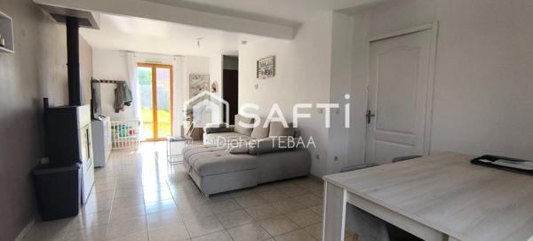 Maison avec jardin et garage, proche gare