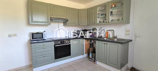 Maison avec jardin et garage, proche gare