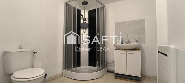 Maison avec jardin et garage, proche gare