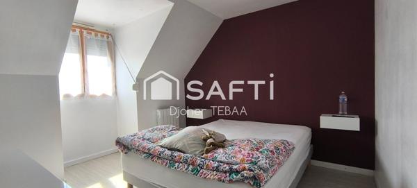 Maison avec jardin et garage, proche gare