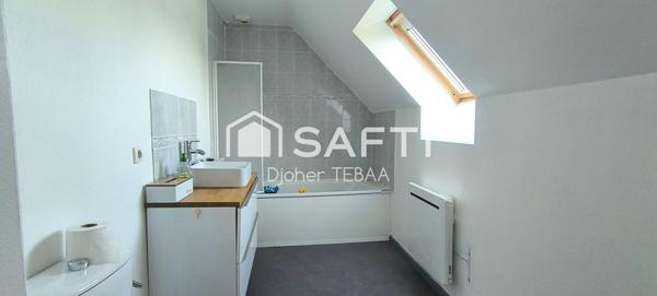 Maison avec jardin et garage, proche gare