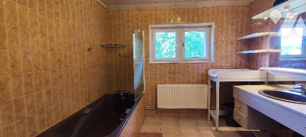 Villa de 190m² aux beaux volumes avec vaste terrain boisé à CUCQ