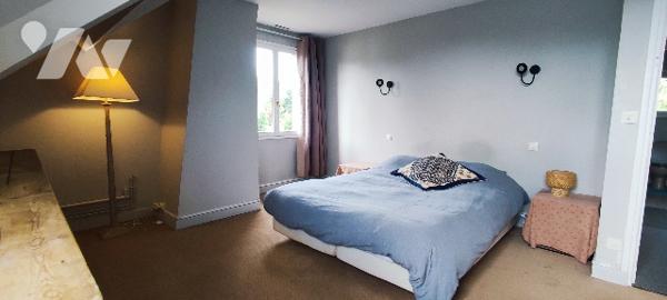 Villa de 190m² aux beaux volumes avec vaste terrain boisé à CUCQ