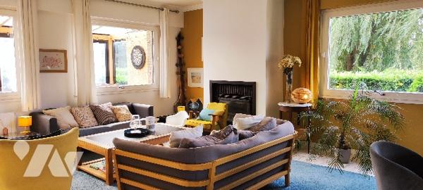 Villa de 190m² aux beaux volumes avec vaste terrain boisé à CUCQ