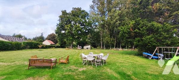 Villa de 190m² aux beaux volumes avec vaste terrain boisé à CUCQ