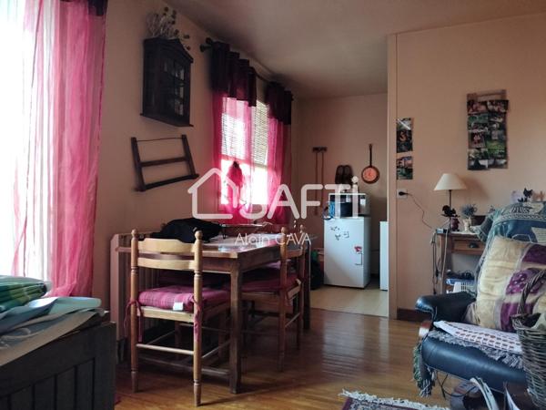 Appartement T2 de 43m² en rez de chaussée avec balcon, cave et petit jardin commun