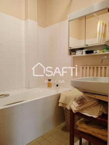 Appartement T2 de 43m² en rez de chaussée avec balcon, cave et petit jardin commun