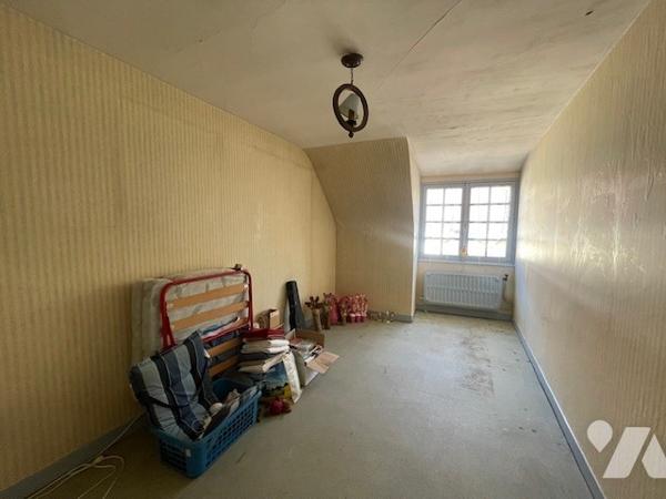 Ancienne librairie au cœur du centre-ville à usage de commerce et d’habitation