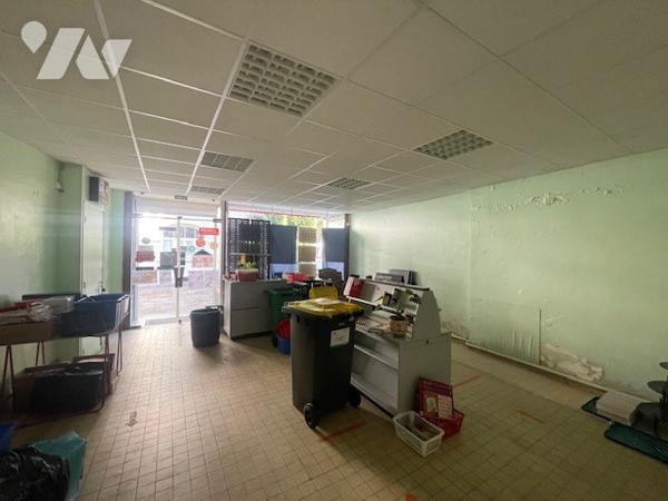 Ancienne librairie au cœur du centre-ville à usage de commerce et d’habitation