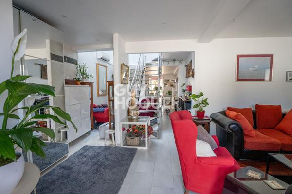 Centre ville -Grand duplex avec terrasses et jardin