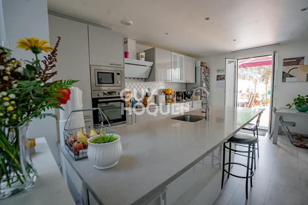 Centre ville -Grand duplex avec terrasses et jardin