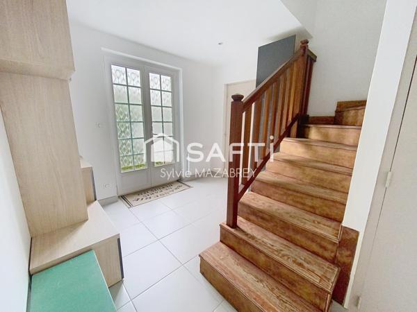 Maison rénovée avec goût dans un environnement paisible et verdoyant