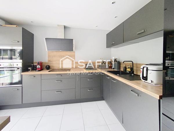 Maison rénovée avec goût dans un environnement paisible et verdoyant