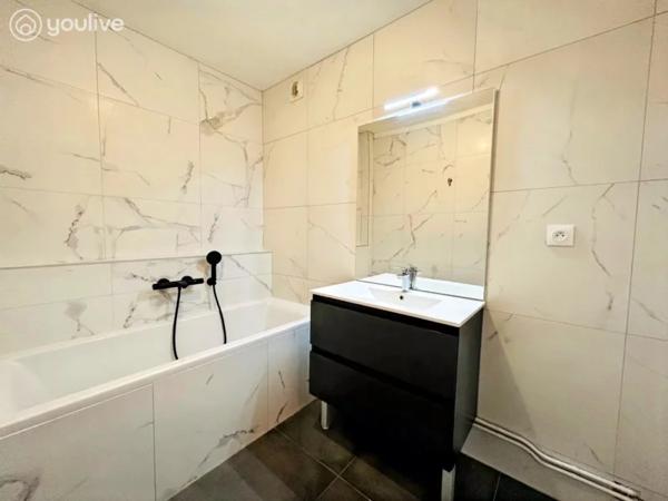 Appartement de 84 m², 3 chambres, balcon et parking