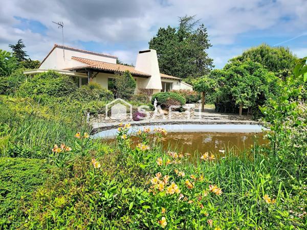 Une vie de plain-pied au calme et au cœur d'un  parc arboré de 7813 m2