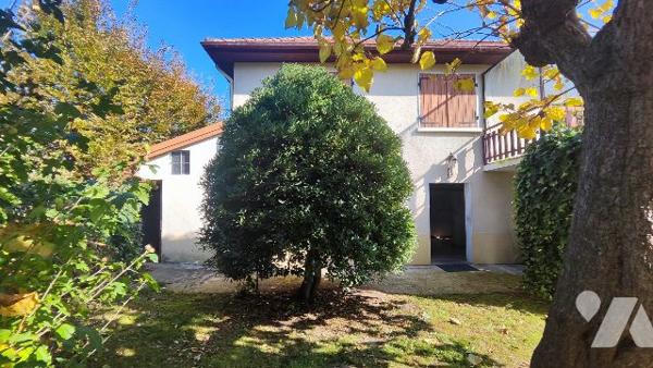 Maison avec grand jardin