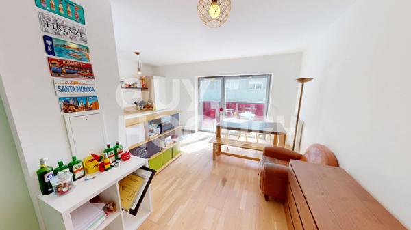 Un 3 pièces moderne avec balcon & parking - 63 m² au coeur d'Ivry Port