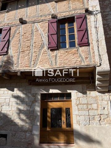 MAISON EN PIERRE TYPE 9 DANS LE VILLAGE DE CASTELNEAU DE MONTMIRAL