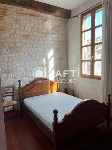 MAISON EN PIERRE TYPE 9 DANS LE VILLAGE DE CASTELNEAU DE MONTMIRAL