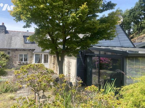 Véranda ouverte sur un magnifique jardin en coteau de plus de 5000m²/ rénovation de qualité