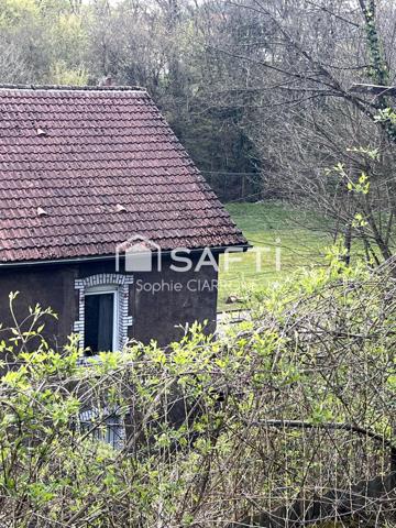 À vendre à Cantebonne , Terrain d'une superficie de 11 ares + Maison 95 M2 avec Garages
