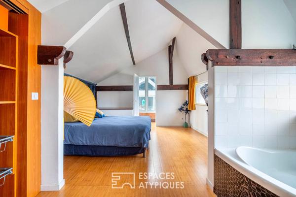 Triplex inversé avec piscine intérieure, terrasse et studio indépendant