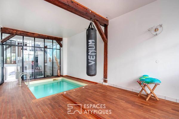 Triplex inversé avec piscine intérieure, terrasse et studio indépendant