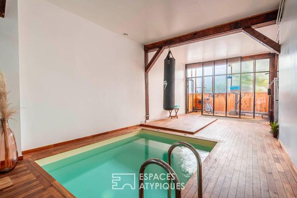 Triplex inversé avec piscine intérieure, terrasse et studio indépendant